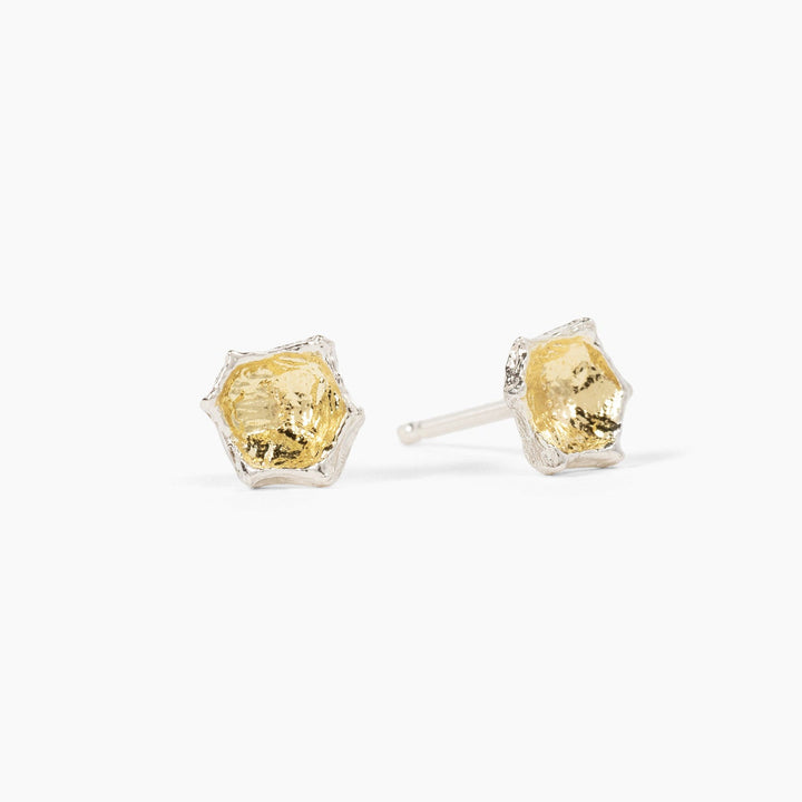 Thicket honeycomb studs in sterling silver and 14k yellow gold on a white background