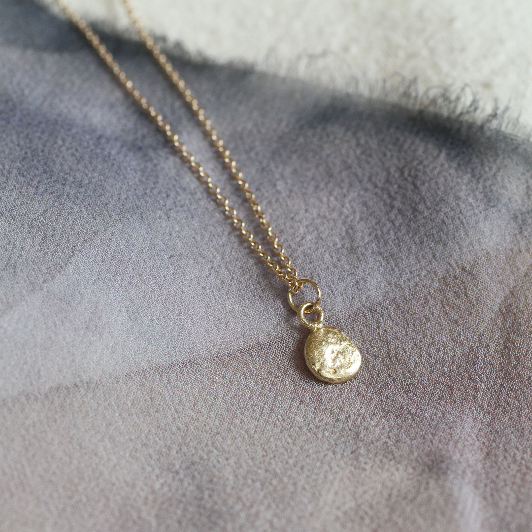 skipping stone necklace