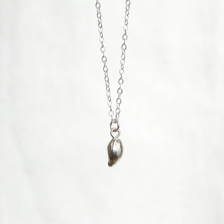 lemon seed necklace