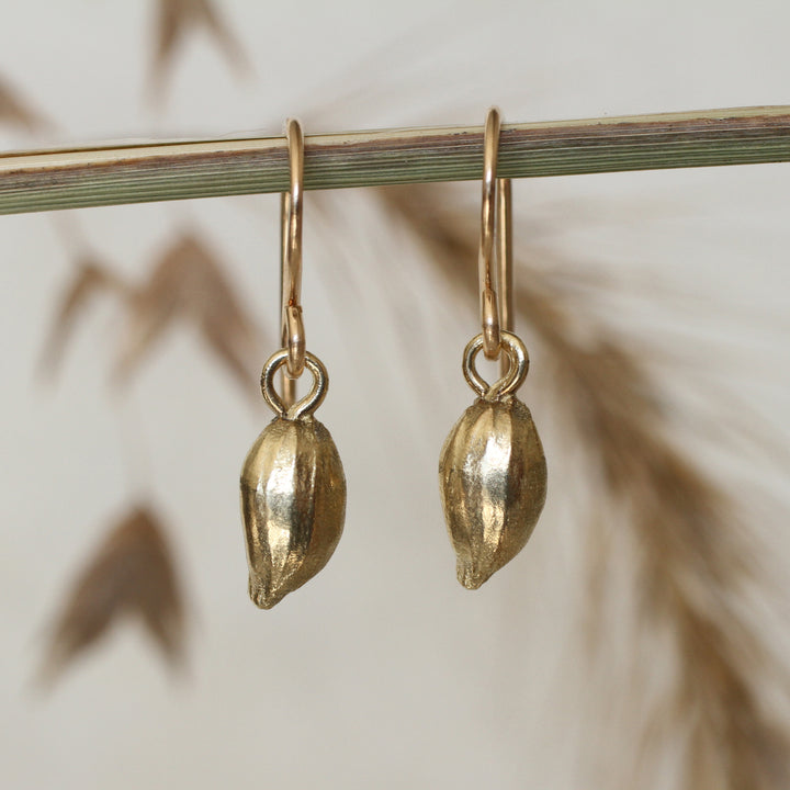 lemon seed earrings