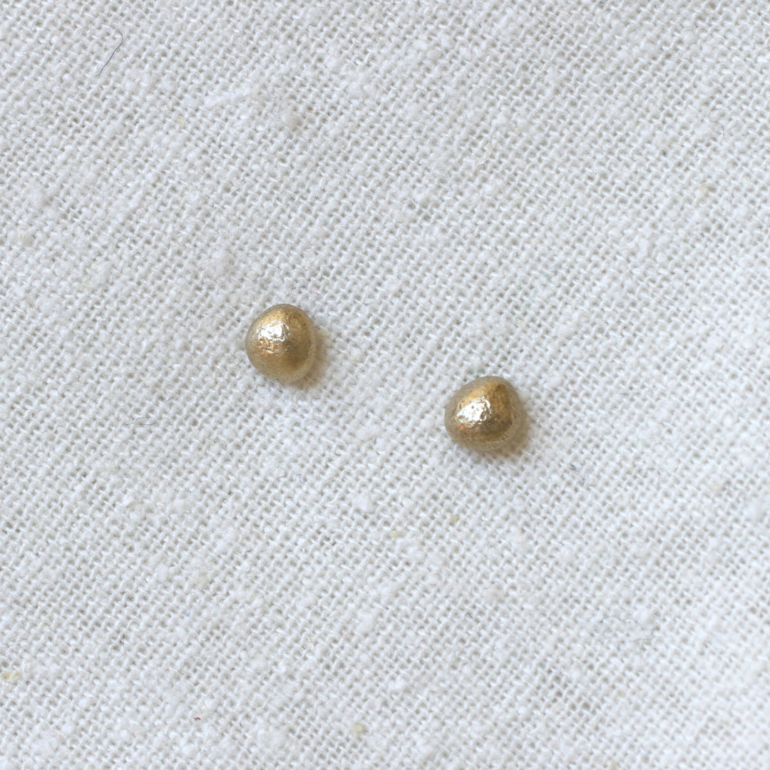 river pebble studs
