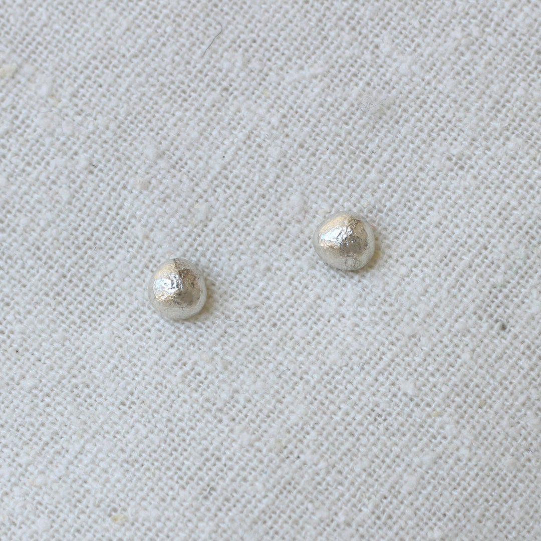 river pebble studs