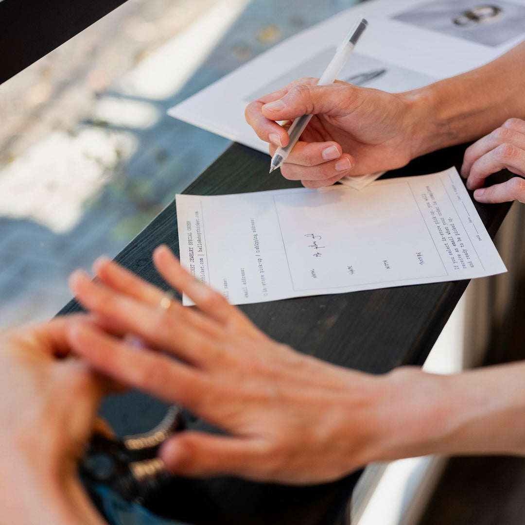Two people at a custom bands consultation.