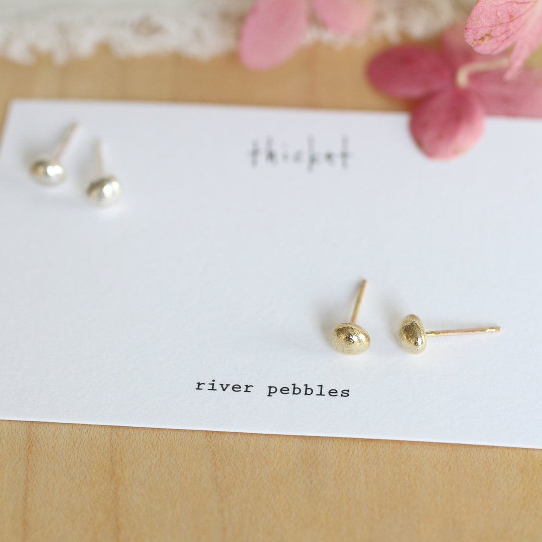 river pebble studs