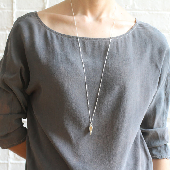 hollow milkweed seed pod necklace